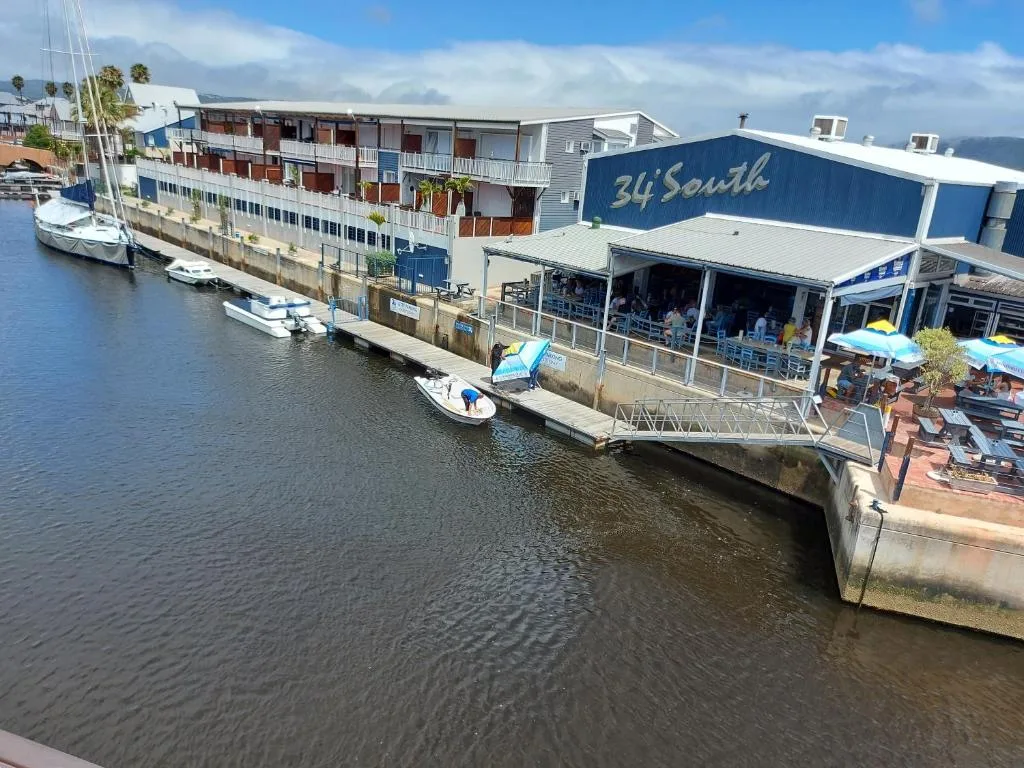 Belle View @ Knysna Quays — waterfront apartment exterior facing the lagoon, Knysna
