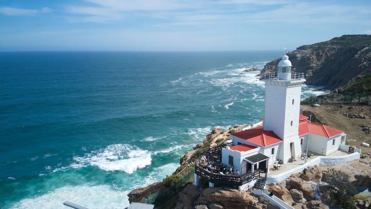 Cape St Blaize Lighthouse on the rocky headland above the Indian Ocean at Mossel Bay